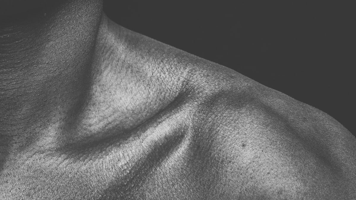 black textile in grayscale photography